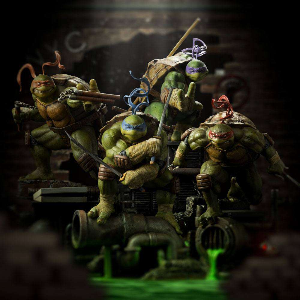 Iron Studios Teenage Mutant Ninja Turtles 1/10 scale statues featuring Leonardo and the team in a dynamic sewer setting.