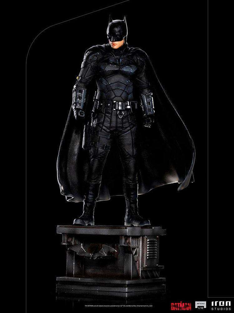 Iron Studios The Batman 1/10 scale statue featuring the hero in a detailed black tactical suit on a display base.