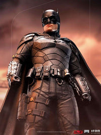 Low-angle view of Iron Studios 1/10 The Batman statue featuring a detailed black tactical suit and utility belt.