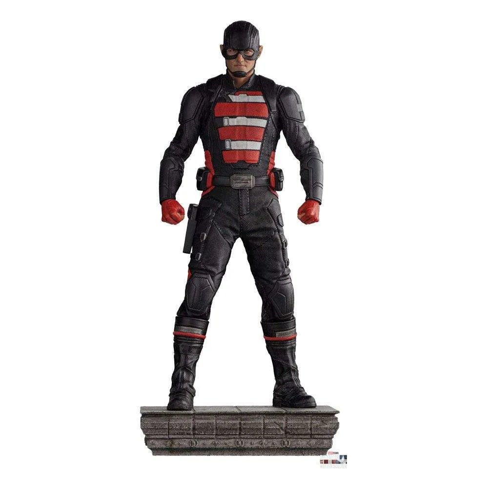 Front view of the 22cm Iron Studios U.S. Agent statue in a black tactical suit with red and white chest detailing.
