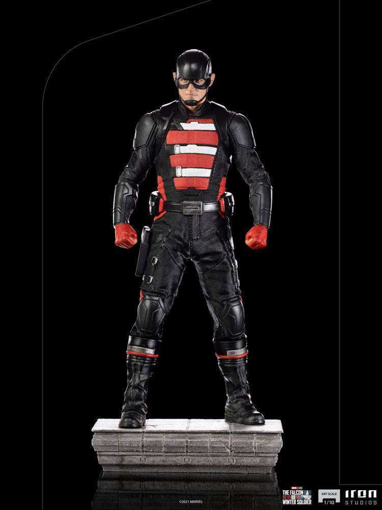 Iron Studios 1/10 John Walker U.S. Agent statue in a black tactical suit with red accents, standing on a stone base.