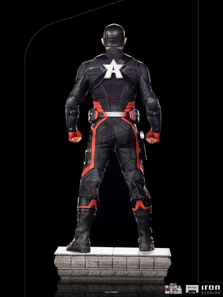 Back view of Iron Studios John Walker U.S. Agent 1/10 scale statue in a black and red tactical suit on a stone base.