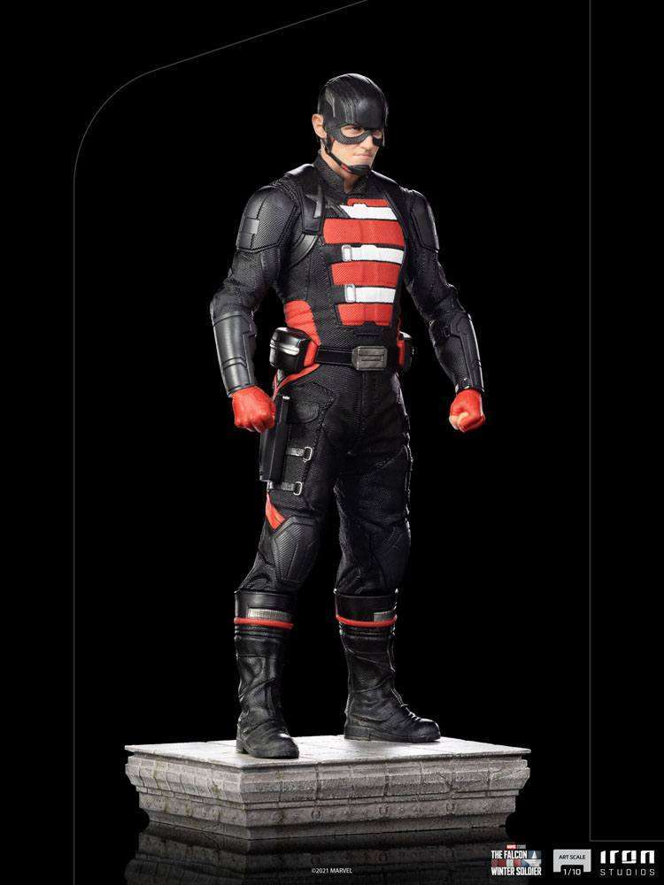 Iron Studios 1/10 John Walker U.S. Agent statue in black tactical suit with red accents, standing on a stone base.