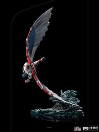 Iron Studios 1/10 scale Captain America Sam Wilson statue in a dynamic flying pose with red, white, and blue wings.