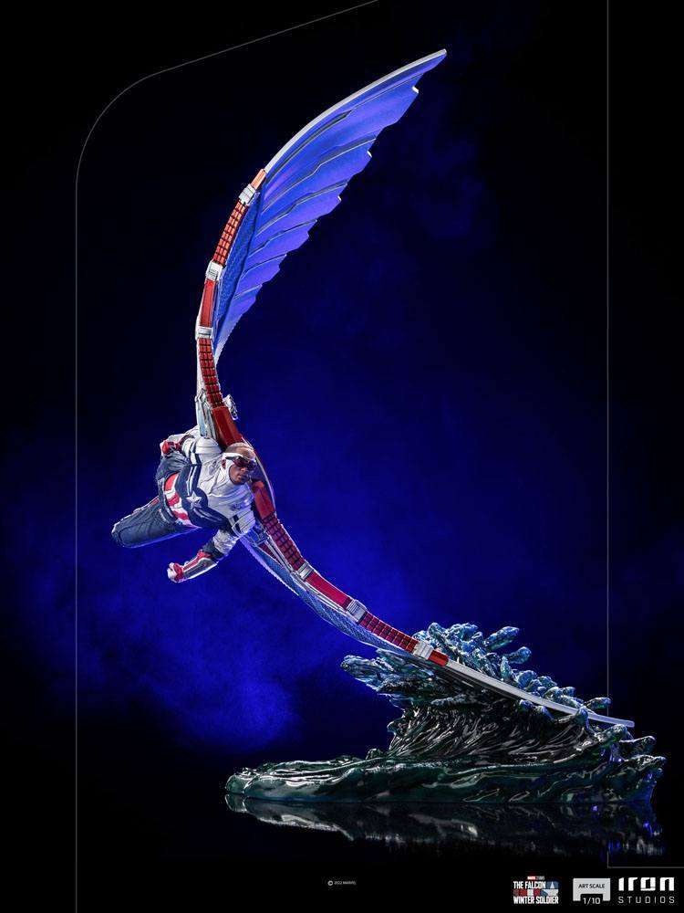 Iron Studios Sam Wilson Captain America 1/10 scale statue in a dynamic flying pose with blue wings and water base.