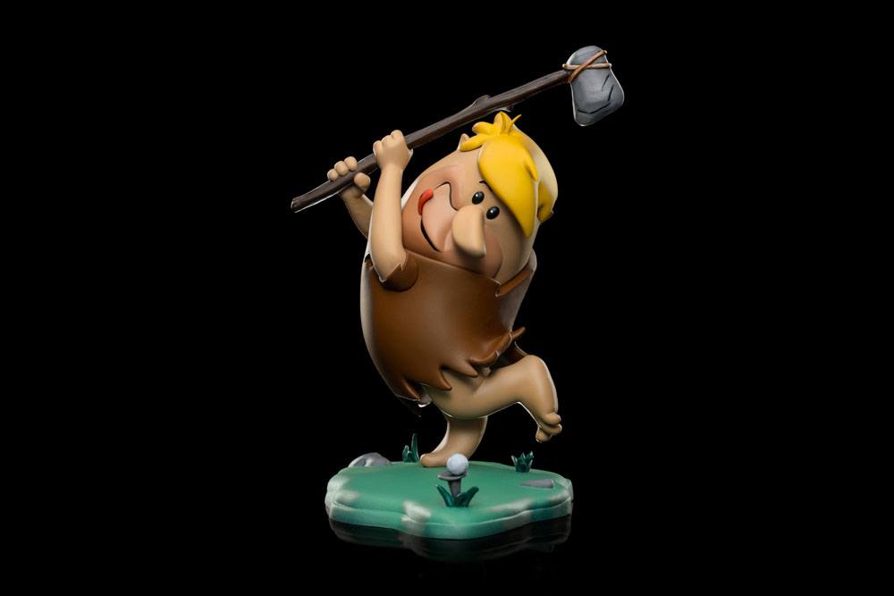 Iron Studios Barney Rubble 1/10 scale statue in a dynamic pose holding a club on a green base against a black background.