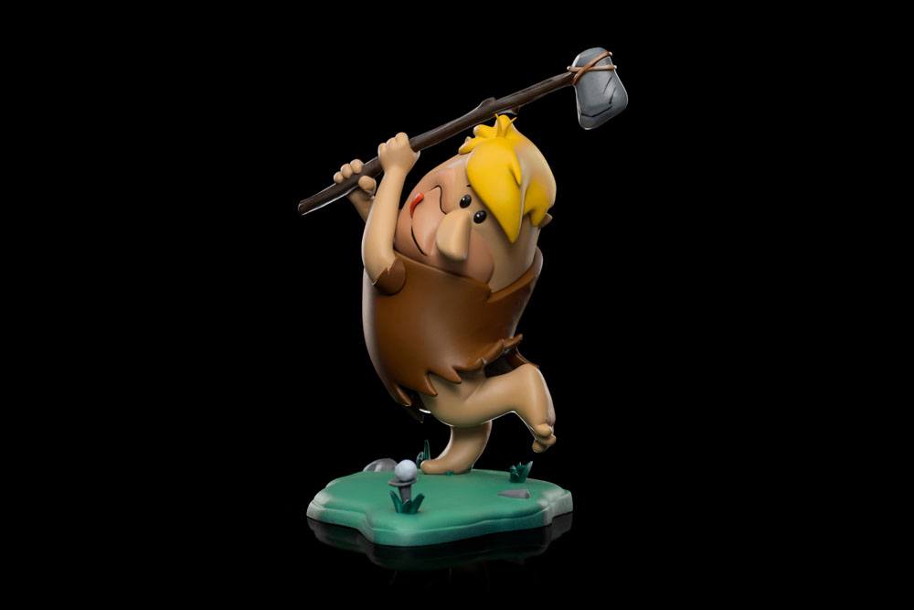 Iron Studios 1/10 scale Barney Rubble statue swinging a stone club on a green base against a black background.