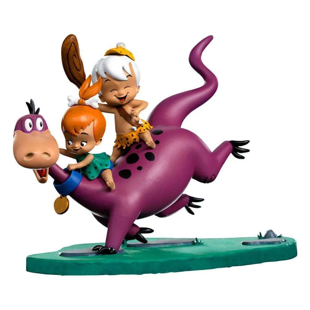 Iron Studios 1/10 scale statue of Dino, Pebbles, and Bamm-Bamm, featuring the colorful characters on a green base.