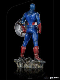 Back view of Iron Studios Captain America Battle of NY 1/10 scale statue featuring his iconic shield and rocky base.