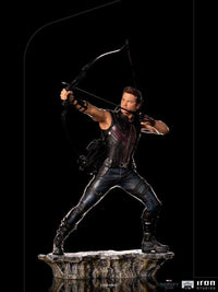Iron Studios Hawkeye 1/10 scale statue from The Infinity Saga, featuring the hero aiming a bow on a rocky base.