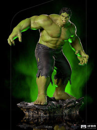Iron Studios Hulk Battle of NY 1/10 scale statue in a dynamic pose on a rocky base with green lighting effects.