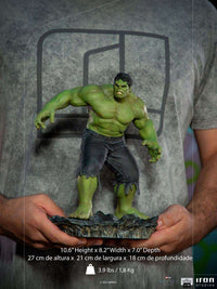 Iron Studios 1/10 Hulk Battle of NY statue in a dynamic pose, held in hands to show scale and detailed green skin.