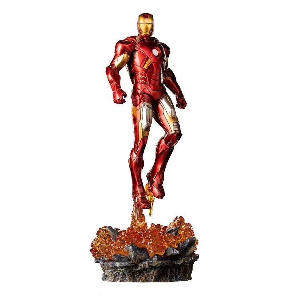 Iron Studios 1/10 Iron Man Battle of NY statue in red and gold armor, hovering above a rocky, fiery display base.