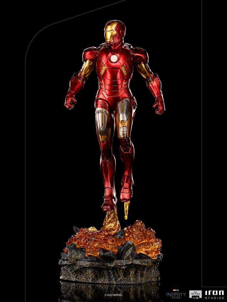 Iron Studios 1/10 Iron Man Battle of NY statue in red and gold armor, floating above a fiery, debris-filled base.