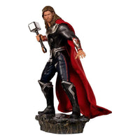 Iron Studios 1/10 Thor Battle of NY statue featuring a detailed metallic armor, flowing red cape, and Mjolnir hammer.