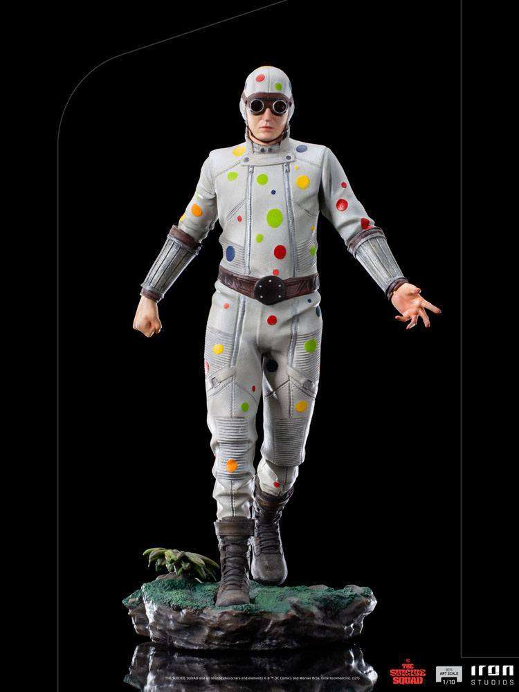 Front view of Iron Studios Polka-Dot Man 1/10 scale statue in a white suit with colorful dots on a rocky base.