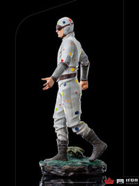 Side view of Iron Studios Polka-Dot Man 1/10 scale statue featuring a white suit with colorful dots on a base.