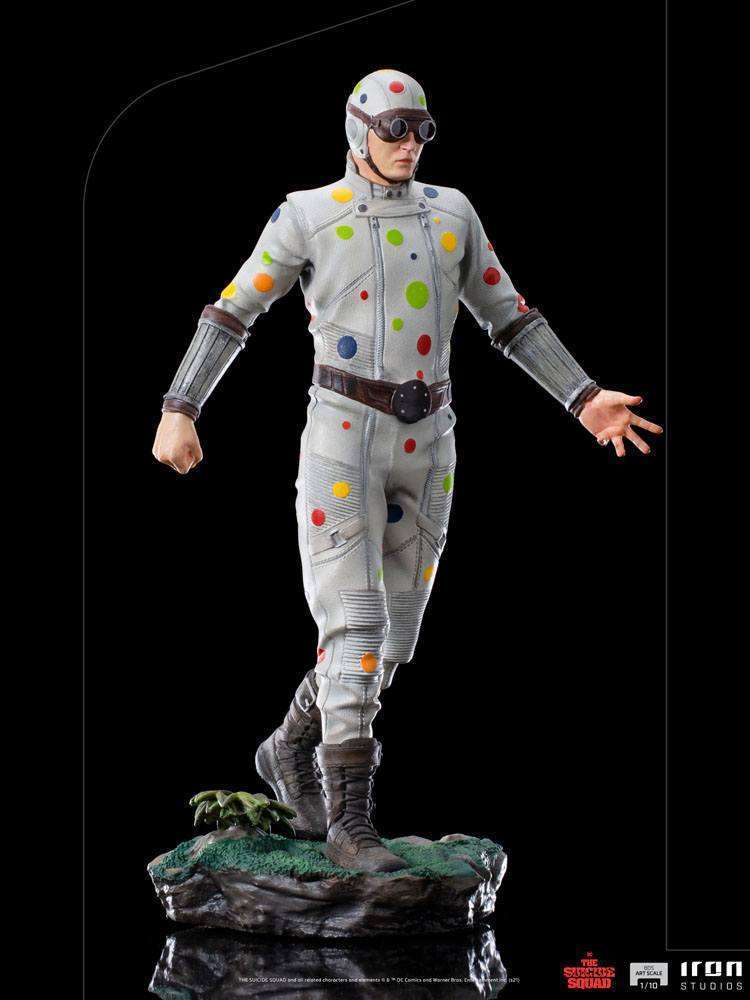Iron Studios Polka-Dot Man 1/10 scale statue in a grey suit with colorful dots, goggles, and a rocky display base.