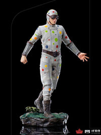 Iron Studios Polka-Dot Man 1/10 scale statue in a grey suit with colorful dots, goggles, and a rocky display base.