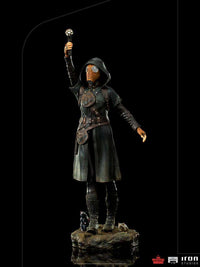 Iron Studios Ratcatcher II 1/10 scale statue featuring a hooded figure with a gas mask, holding a glowing rod on a base.
