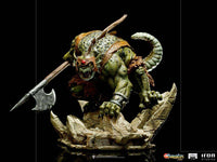 Iron Studios Slithe 1/10 scale statue featuring the green reptilian villain holding a battle axe on a rocky base.