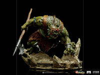 Iron Studios 1/10 scale Slithe statue from ThunderCats, featuring a green reptilian warrior wielding an axe on a base.