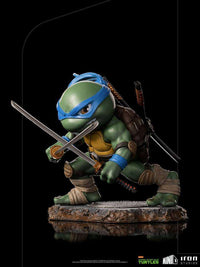 Iron Studios Leonardo Mini Co. PVC figure in a dynamic combat pose with dual katanas on a textured rocky base.
