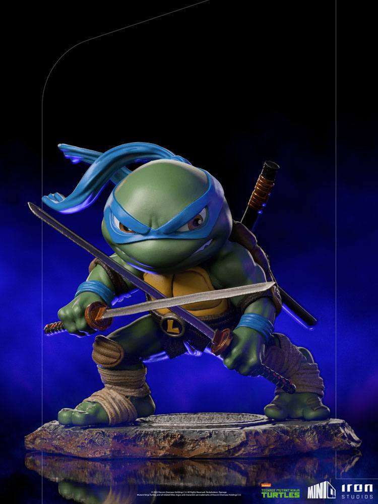 Iron Studios Leonardo Mini Co. PVC figure in a dynamic fighting pose with dual katanas on a textured stone base.