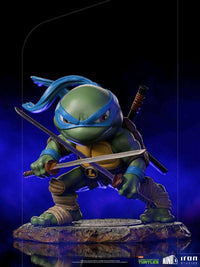Iron Studios Leonardo Mini Co. PVC figure in a dynamic fighting pose with dual katanas on a textured stone base.