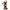Iron Studios Michelangelo Mini Co. PVC figure on a skateboard, featuring orange mask, pizza slice, and brick base.