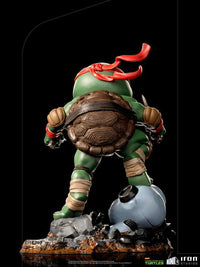 Back view of Iron Studios TMNT Mini Co. Raphael PVC figure, 16 cm, showing his shell, red mask, and rocky base.