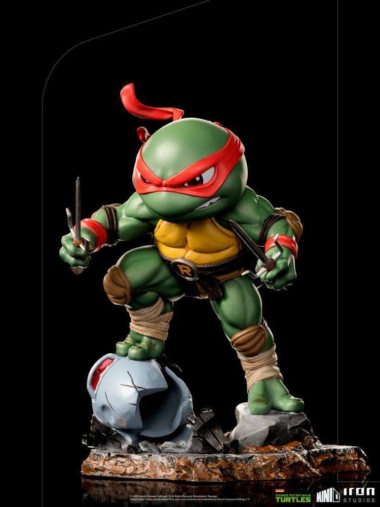 Iron Studios Raphael Mini Co. PVC figure, 16 cm, in a dynamic combat pose with twin sai on a rubble base.