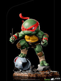 Iron Studios Raphael Mini Co. PVC figure, 16 cm, in a dynamic combat pose with twin sai on a rubble base.