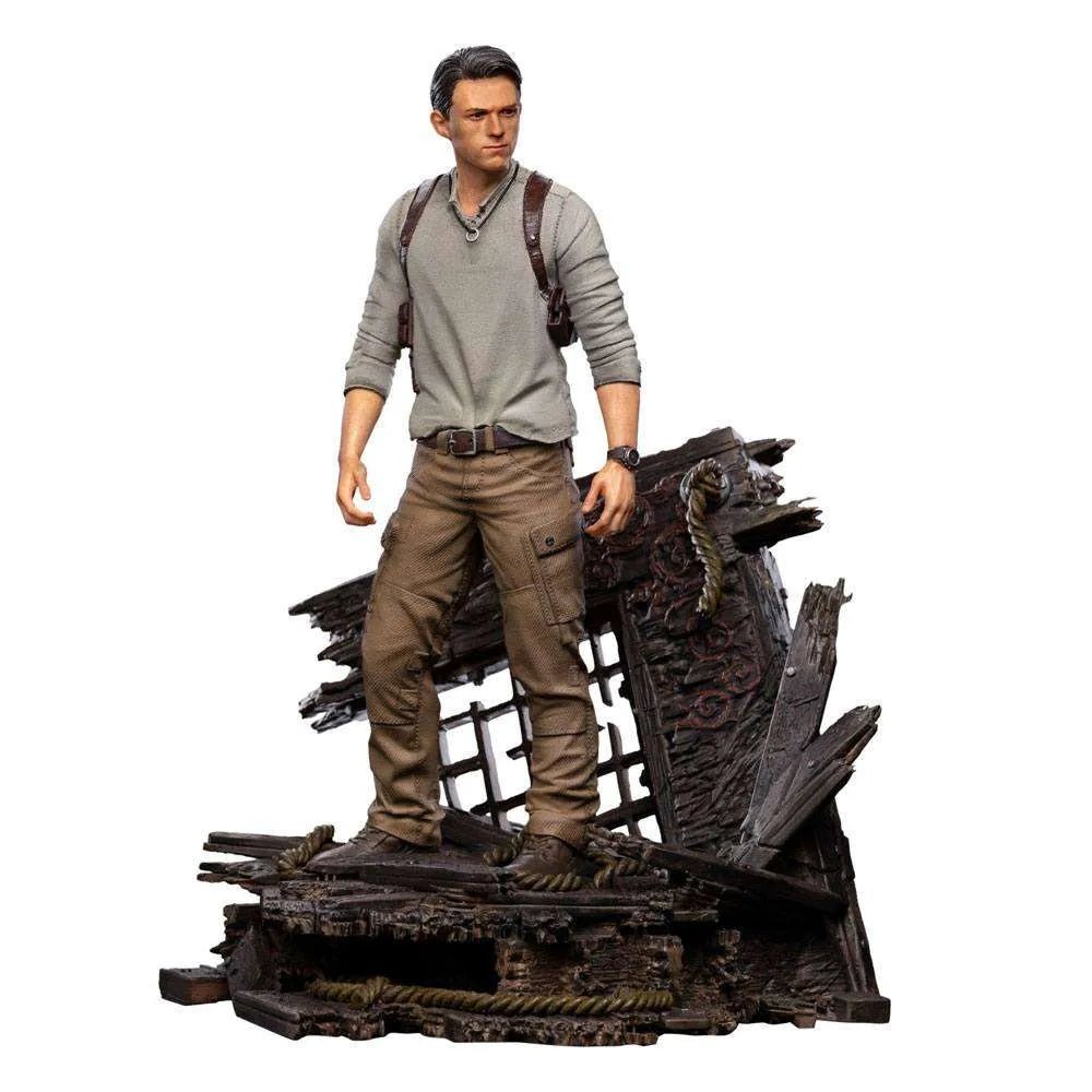 Iron Studios 1/10 Nathan Drake statue from the Uncharted movie, standing on a detailed shipwreck base, front view.