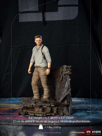 Iron Studios 1/10 Nathan Drake statue from the Uncharted movie, featuring a detailed figure on a shipwreck base.