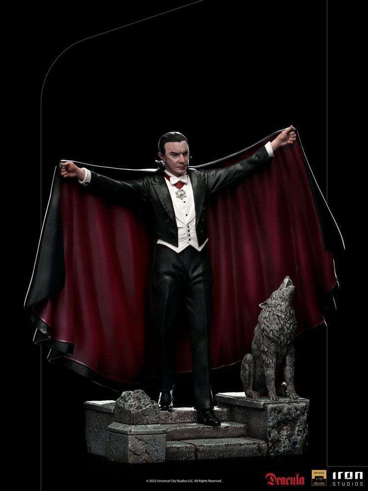 Iron Studios 1/10 Dracula Deluxe Art Scale statue showing the vampire in a black tuxedo with a red-lined cape and wolf.
