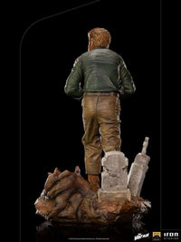 Back view of The Wolf Man 1/10 Deluxe Art Scale statue by Iron Studios, featuring a graveyard base and detailed clothing.