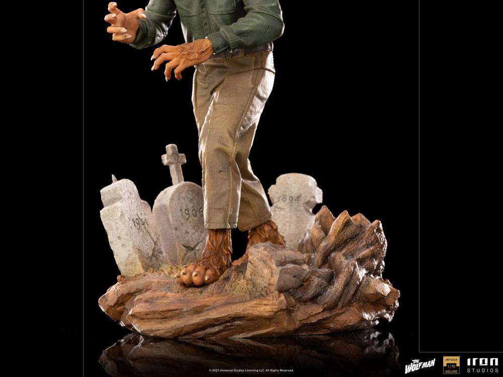Lower body view of The Wolf Man 1/10 scale statue featuring furred feet on a detailed graveyard base with tombstones.