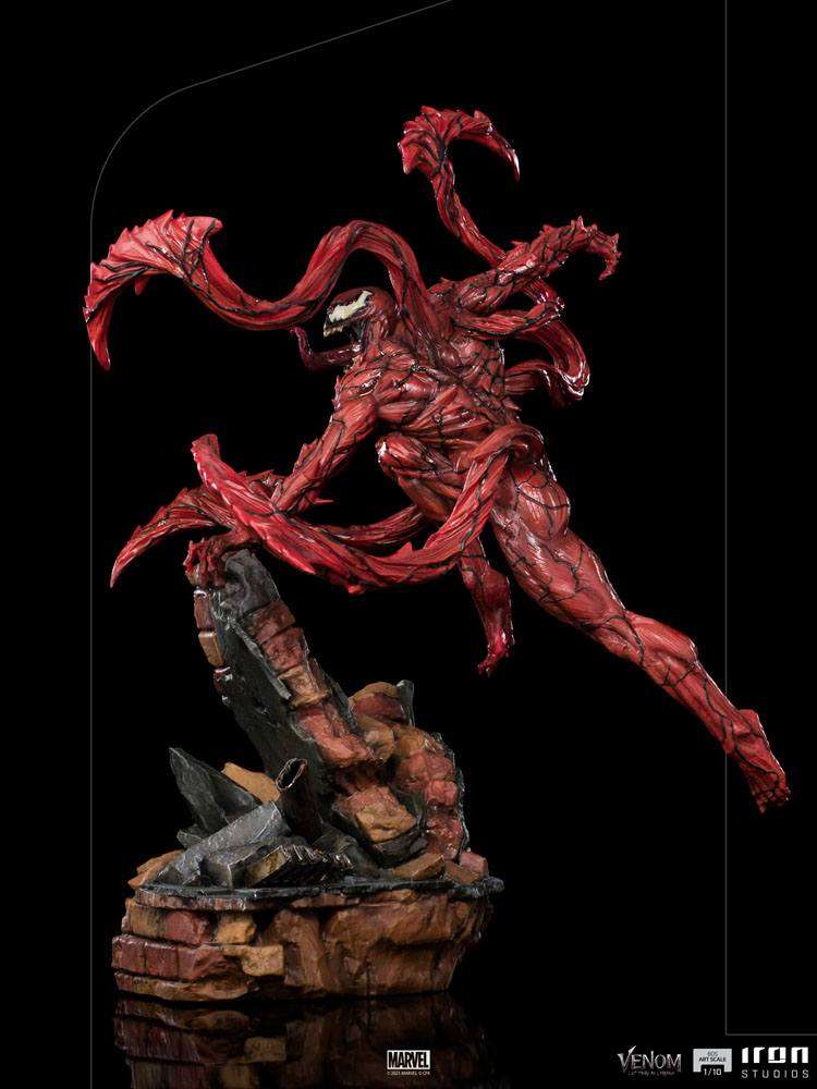 Iron Studios 1/10 Carnage statue from Venom: Let There Be Carnage, featuring a dynamic red symbiote on a brick base.