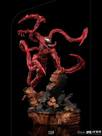 Iron Studios 1/10 scale Carnage statue from Venom: Let There Be Carnage, featuring a red, textured symbiote on rubble.