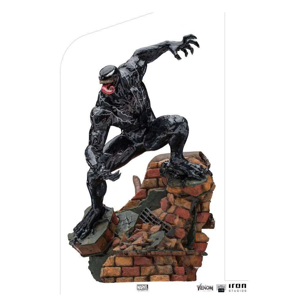 Iron Studios Venom 1/10 scale statue in a dynamic crouching pose on a detailed brick rubble base.