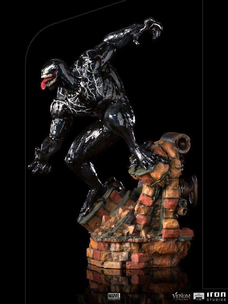 Iron Studios 1/10 Venom statue from Let There Be Carnage, featuring a glossy black figure on a ruined brick base.