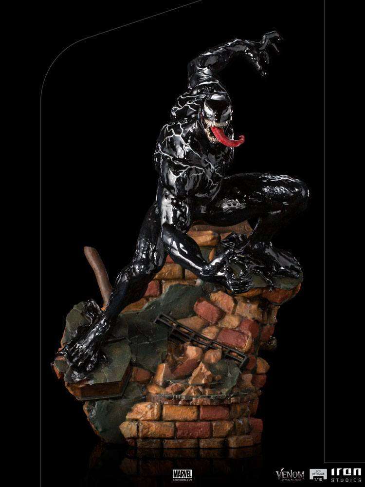Iron Studios Venom 1/10 scale statue in a dynamic crouching pose on a detailed brick rubble base.
