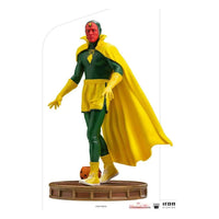 Iron Studios 1/10 Vision Halloween Version statue in a green and yellow costume standing on a circular base.