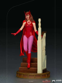 Iron Studios WandaVision 1/10 scale statue of Wanda in her red Halloween costume descending a wooden staircase.