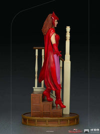 Side view of Iron Studios WandaVision 1/10 scale statue featuring Wanda in her red Halloween costume on stairs.