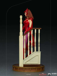 Side view of Iron Studios WandaVision Halloween Wanda 1/10 scale statue standing on a staircase base.