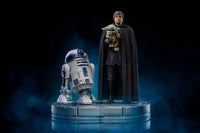 Iron Studios 1/10 scale Luke Skywalker and Grogu statue with R2-D2 on a circular display base against a dark background.