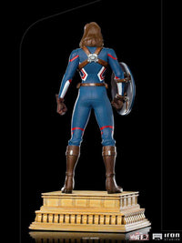 Back view of Iron Studios Captain Carter 1/10 scale statue in a blue uniform with shield on a tiered display base.
