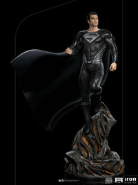 Iron Studios 1/4 scale Superman Black Suit statue from Justice League, featuring a dynamic pose on a rocky base.